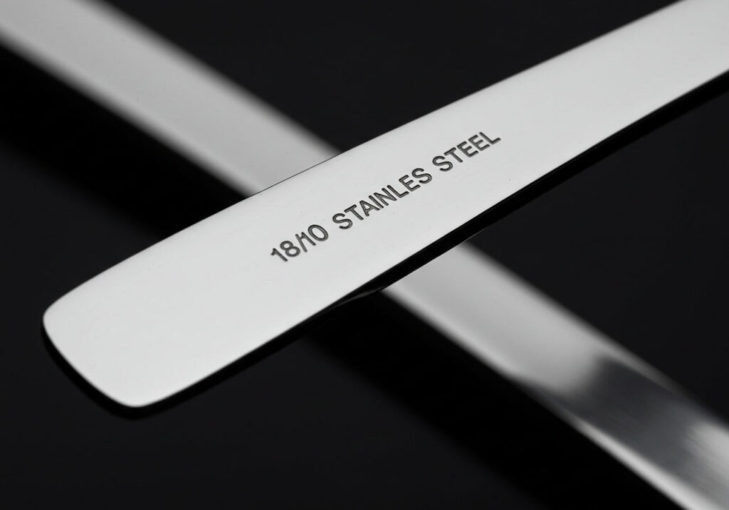 A comparison showing the sheen of 18/10, 18/8, and 18/0 grade stainless steel