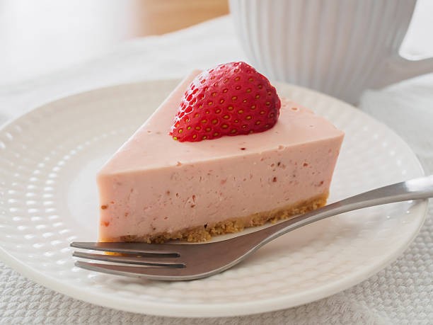 A close-up shot of a three-pronged cake fork, highlighting its shape