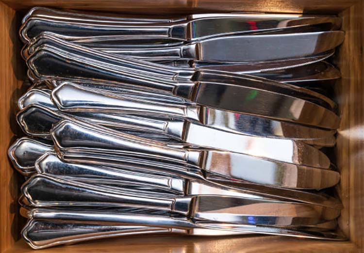 A table showing the different grades of stainless steel used for flatware