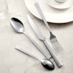 Textured hammered finish detail on stainless steel fork knife spoon set