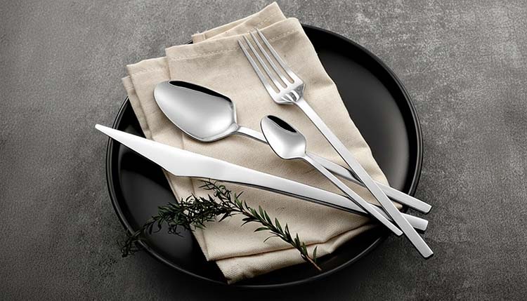 A close-up shot of a sharp, polished knife edge reflecting light