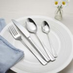 Decorative beaded edge detail on stainless steel spoon fork knife set