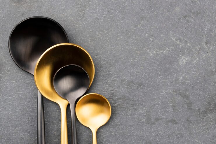 Teaspoon vs. Coffee Spoon A teaspoon and a smaller coffee spoon side-by-side on a table.