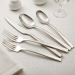Textured hammered finish detail on stainless steel fork knife spoon set