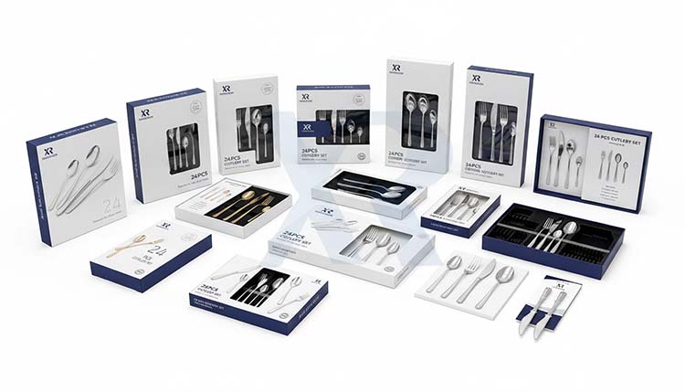 Workers inspecting and packaging finished flatware into custom boxes