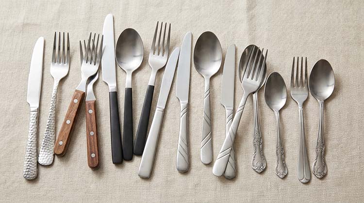 A close-up of different custom flatware finishes