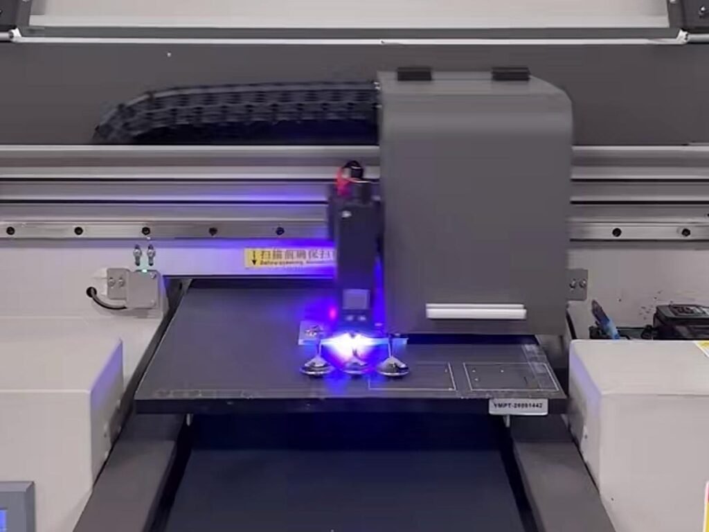UV Printing Process on Cutlery Diagram showing the process of UV printing on a stainless steel spoon, from ink application to UV curing